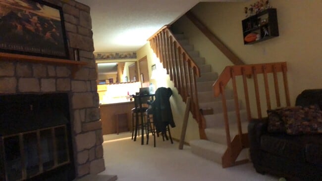 Sala de estar contigua al comedor/cocina - 8185 S Fillmore Cir