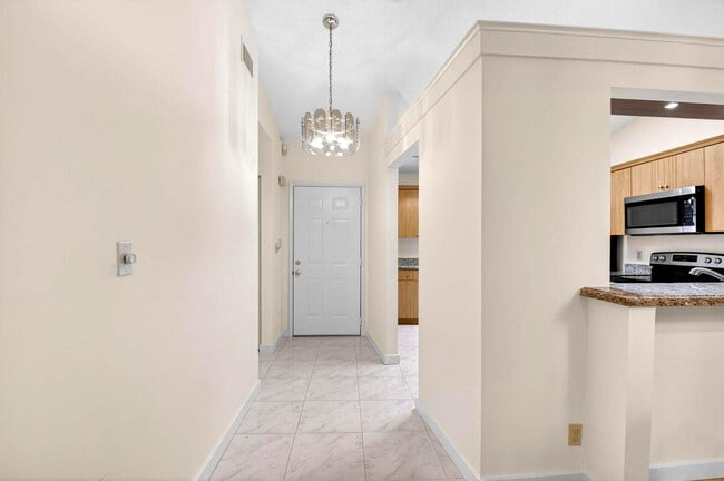 Photo - 10938 Roebelini Palm Ct