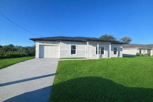 Building Photo - NEW CONSTRUCTION- Modern 3 Bed / 2 Bath Home in Lehigh Acres