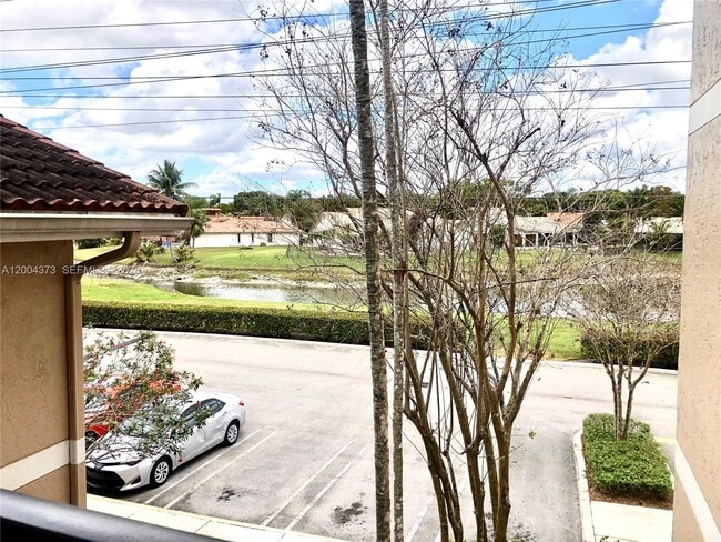 Photo - 8761 Wiles Rd Unit 306