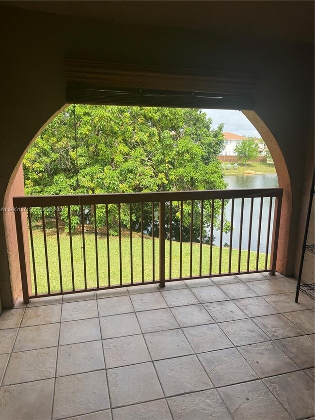 Building Photo - 10233 NW 9th St Cir Unit 210-1