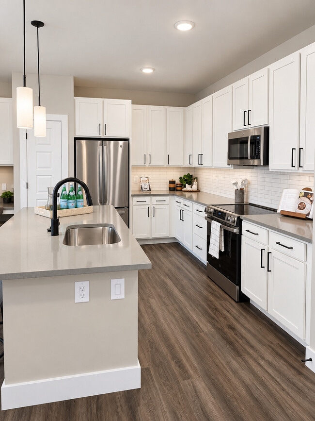 Quartz Countertops with Stainless Steel Appliances
