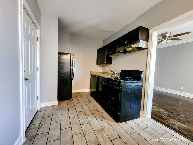 Photo - 6055 S Troy St Unit 2