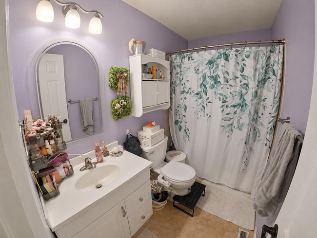Photo - Indoor Balcony + Pet Friendly + Fenced In Yard + Attached Garage + Washer & Dryer Included! Avail...
