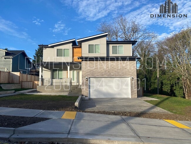 Building Photo - 5811 27th St NE Unit A