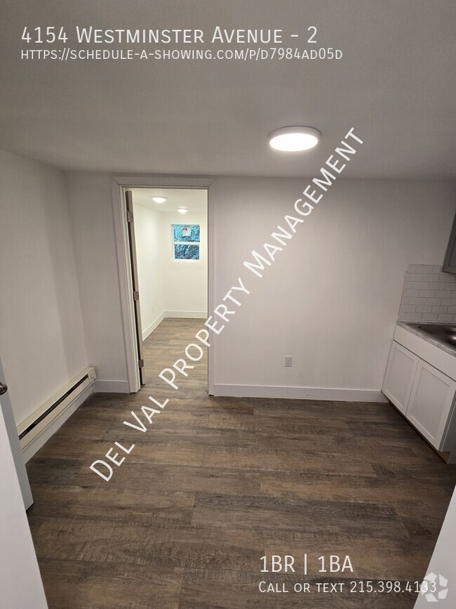 Building Photo - This updated 2nd Floor Apartment in the Mi... Unit 2