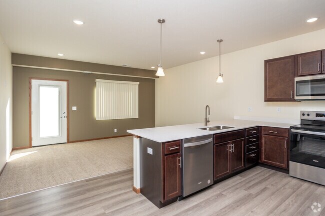 1BR, 1BA - 805SF - Living Room/Dining Room - Wilderness Hills South Apartments