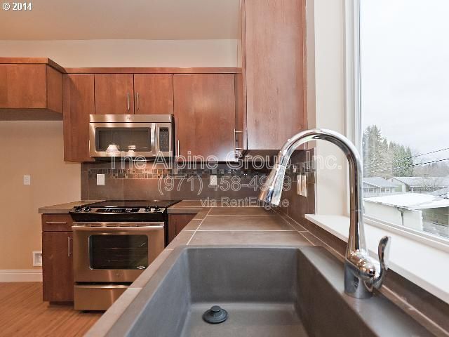 Photo - 14323 SW Compass Dr