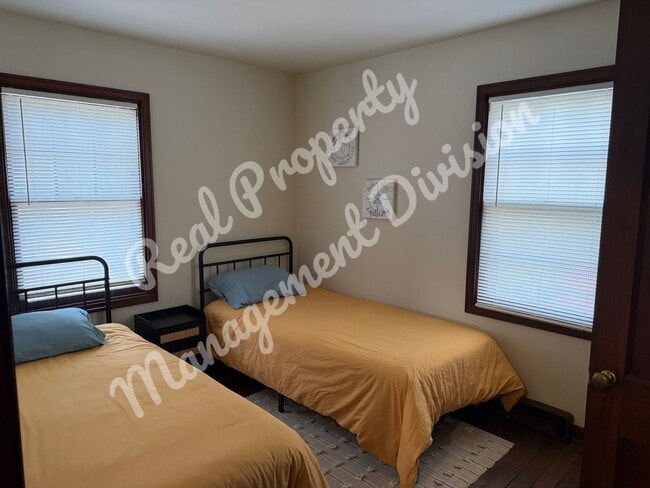 Photo - **Charming 2-Bed, 1-Bath Home with Retro Flair + Garage & Yard**