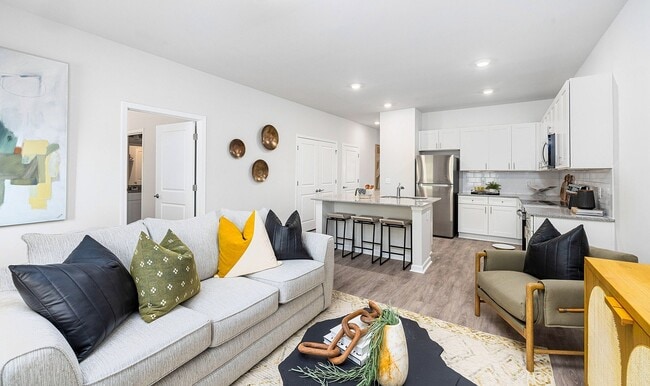 Modern open-concept living room and spacious kitchen