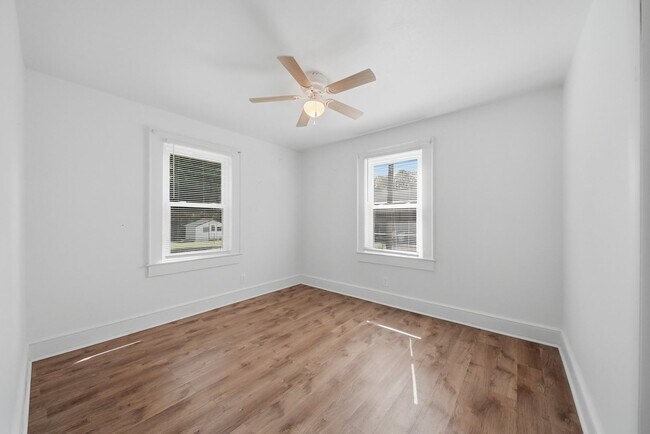 Photo - Charming 2BR Ranch with Spacious Yard & Ample Parking