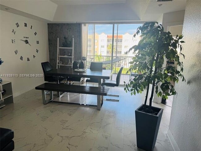 Building Photo - 10700 NW 66th St Unit 10700 NW 66th St  414 (A11928113)