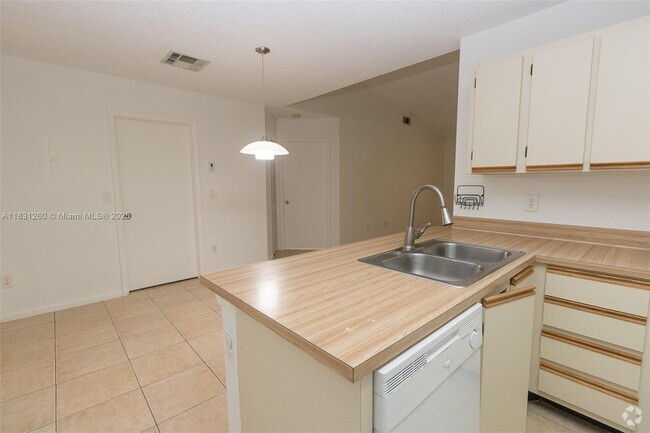 Building Photo - 18328 NW 68th Ave Unit P Rental