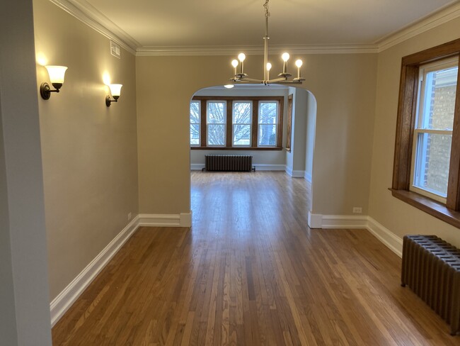 Large living room and dining room - 5632 N Meade Ave Apartments Unit 1