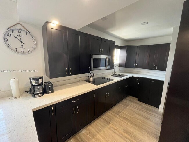 Photo - 6965 Harding Ave Unit 401