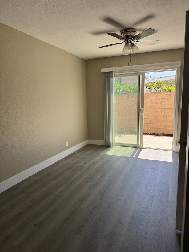 Dining Room with Adjacent Kitchen and Patio - 10676 Walnut St Unit 10676