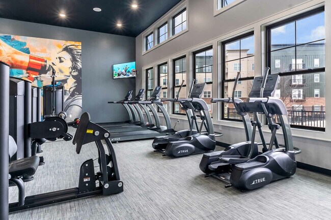 Stay fit and energized in this contemporary gym with top-notch equipment.
