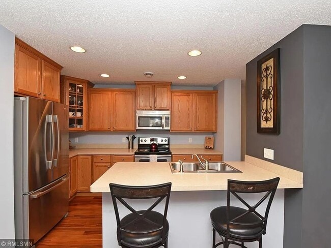 Photo - 3 Bedrooms | Loft | Upper-Level Laundry | 3-Sided Fireplace | Woodbury