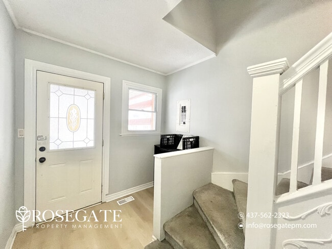 Photo - Spacious 4-Bedroom Main-Level Apartment with Private Backyard & Parking in London Unit 1