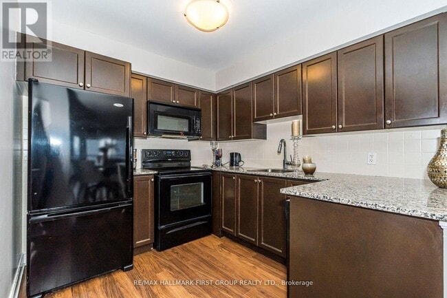 Photo - 125 Village Green Square Unit 1409