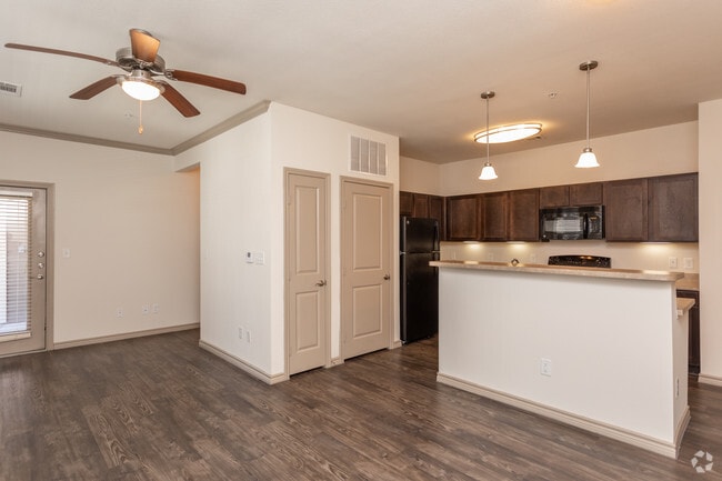 1BR, 1BA - 687SF "THE HORSESHOE" Kitchen & Living Room