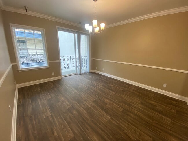 Living room area with courtyard balcony