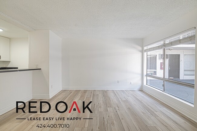 Building Photo - 6555 La Mirada Ave Unit 18