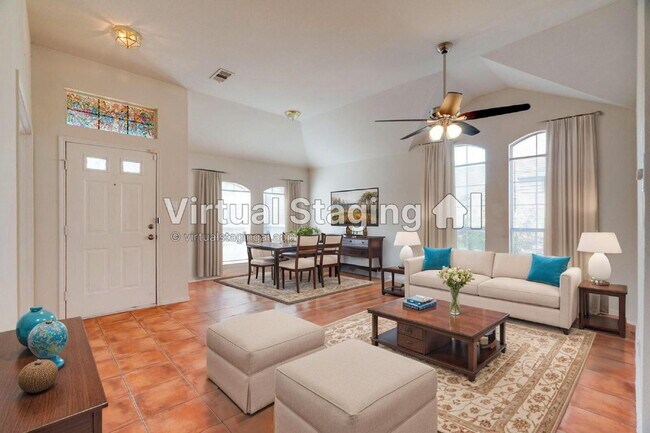 Photo - "Beautiful Single-Story Featuring an Office, Open-Concept Design, Dual Living Areas and a Large O...