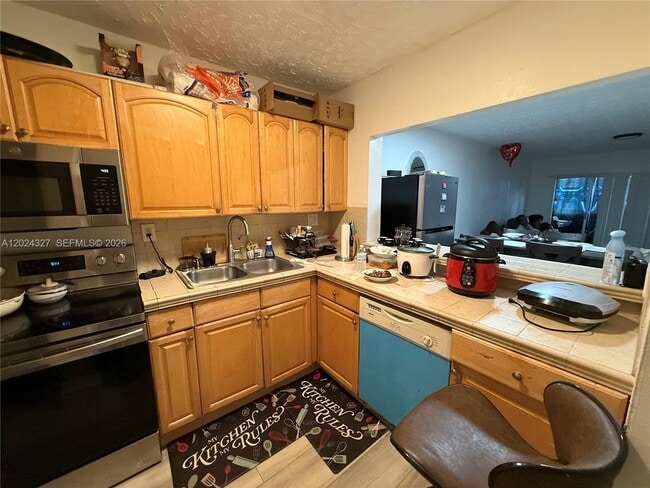Photo - 6070 W 18th Ave Unit 209