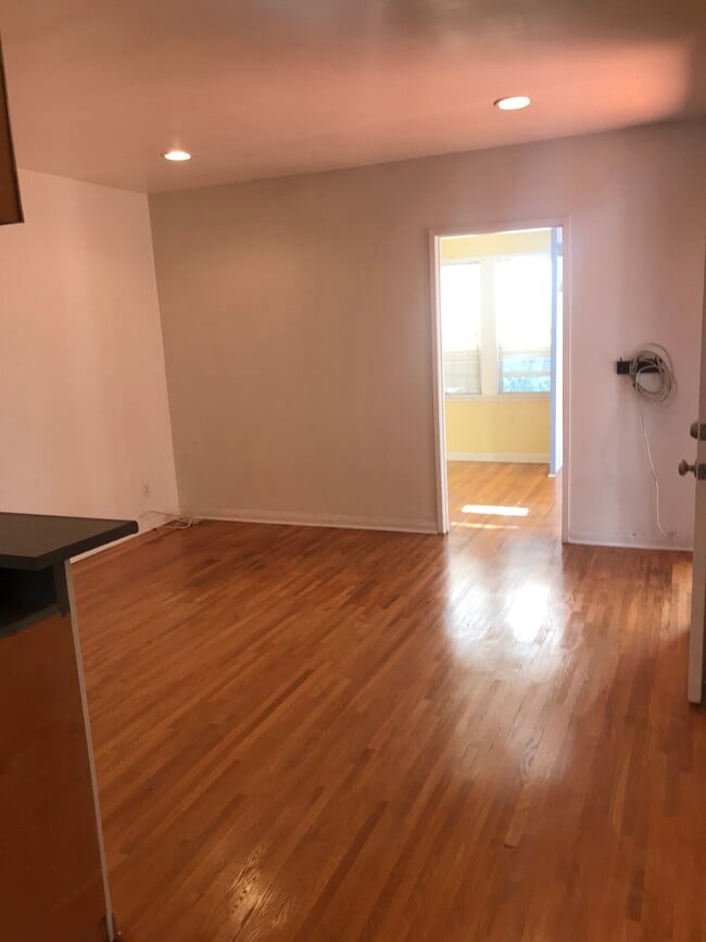 Living Room view into Guest Bedroom - 5362 Monroe St Unit 5362Monroe