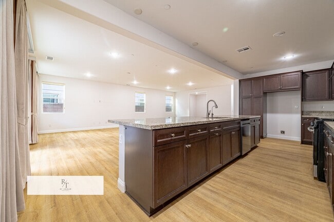 Photo - Bright & Spacious 4-Bedroom Home with Open Living Spaces