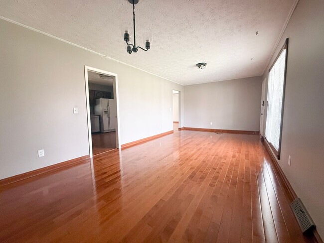 Photo - Spacious 3-Bedroom Home with Huge Yard, Covered Porches & Storage Building