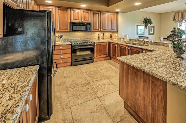 Building Photo - 4751 W Bay Blvd Unit 402