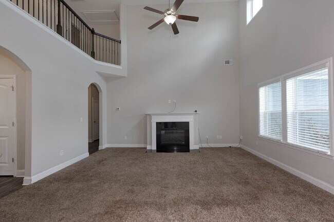 Photo - 4BR/3.5BA · 2,809 SF · Owner's Suite on Main · Fenced Yard · Midland, GA — $2,800/mo