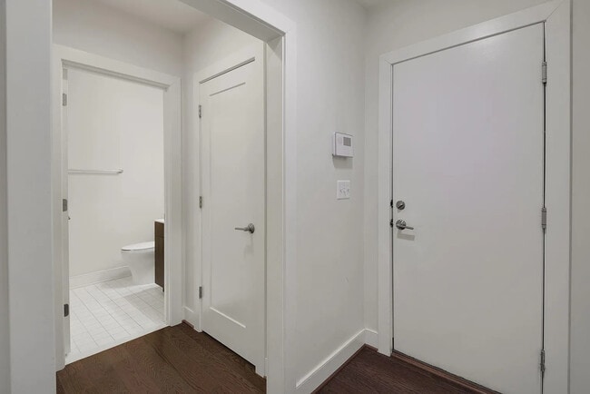 1st Floor Bath and Door to Garage - 70 Ellsworth Heights St