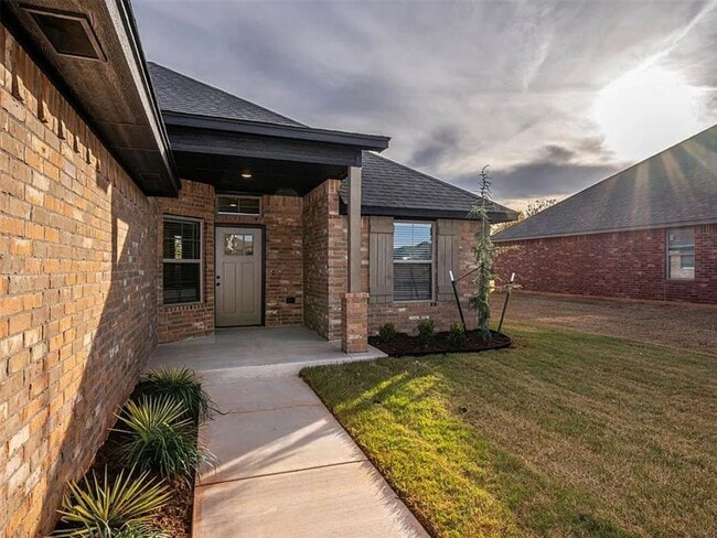 Photo - Modern 4-Bed, 2-Bath Mustang Home with 3-Car Garage!