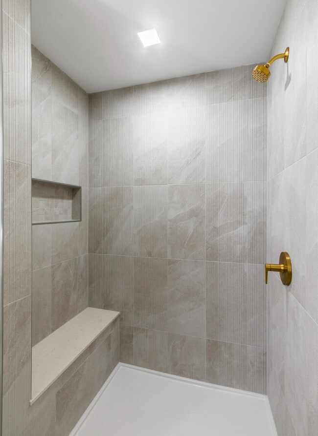 Premium homes feature extra indulgences as well, including hand shower systems in five-piece bathrooms