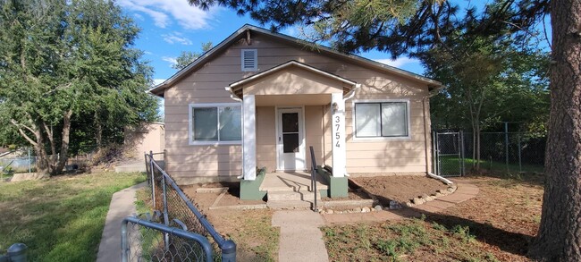 Building Photo - 3754 S Delaware St Unit 3754 (Front)