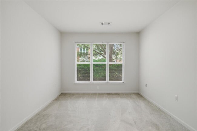 Photo - Commuter’s Paradise! Ground-Level 2BR Condo

Welcome home to this stunning, sun-filled 2-bedroom ... Unit #113