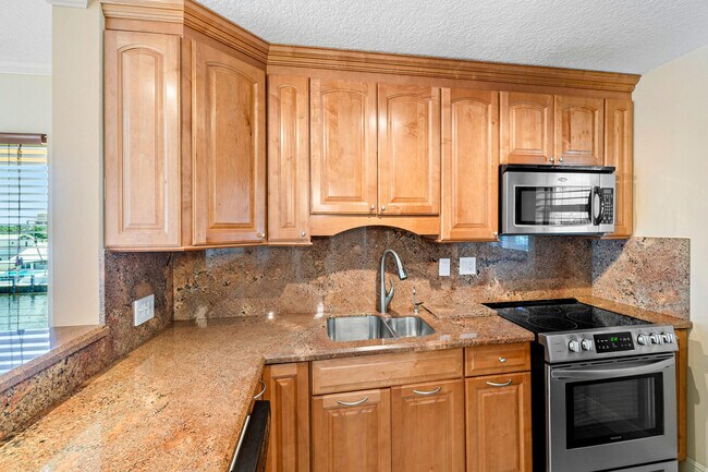 Photo - 750 NE Spanish River Blvd Unidad 410