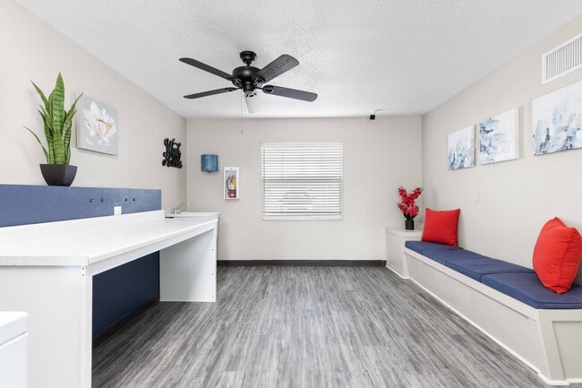 Folding Table and Seating in Laundry Center - Gardens on Griffin