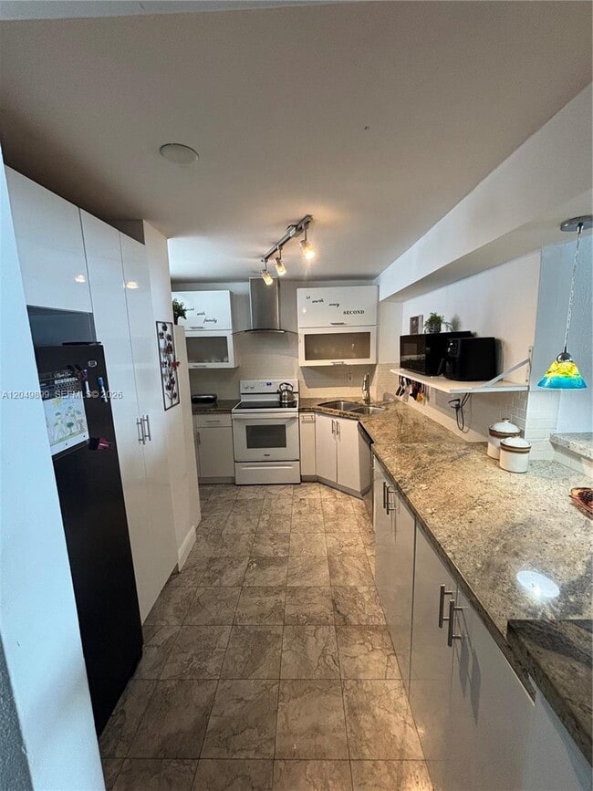 Building Photo - 6450 Collins Ave Unit 1207