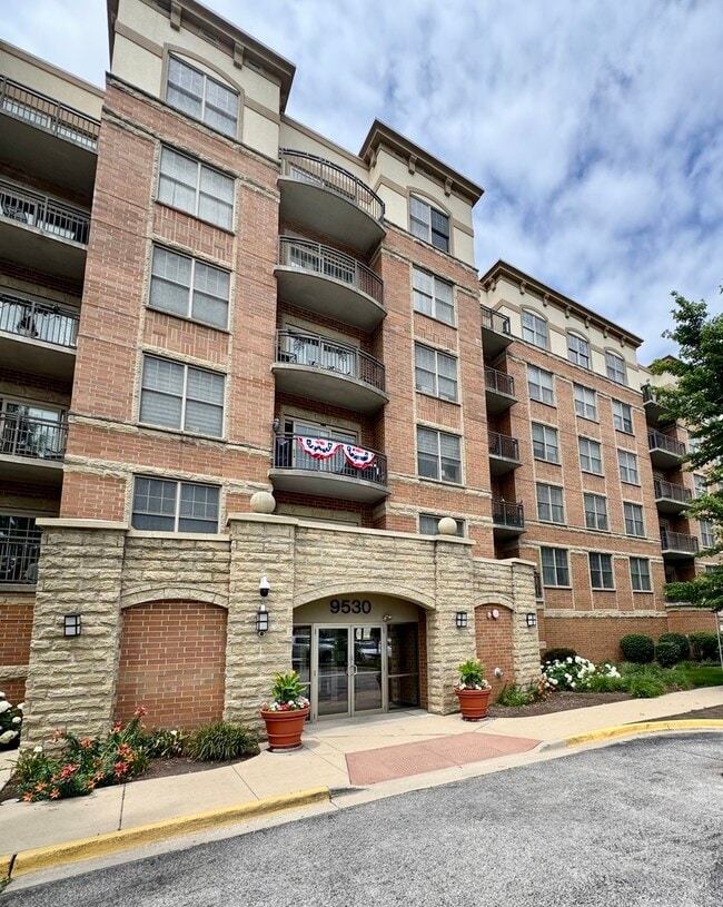 Building Photo - 9530 Cook Ave Unit 305