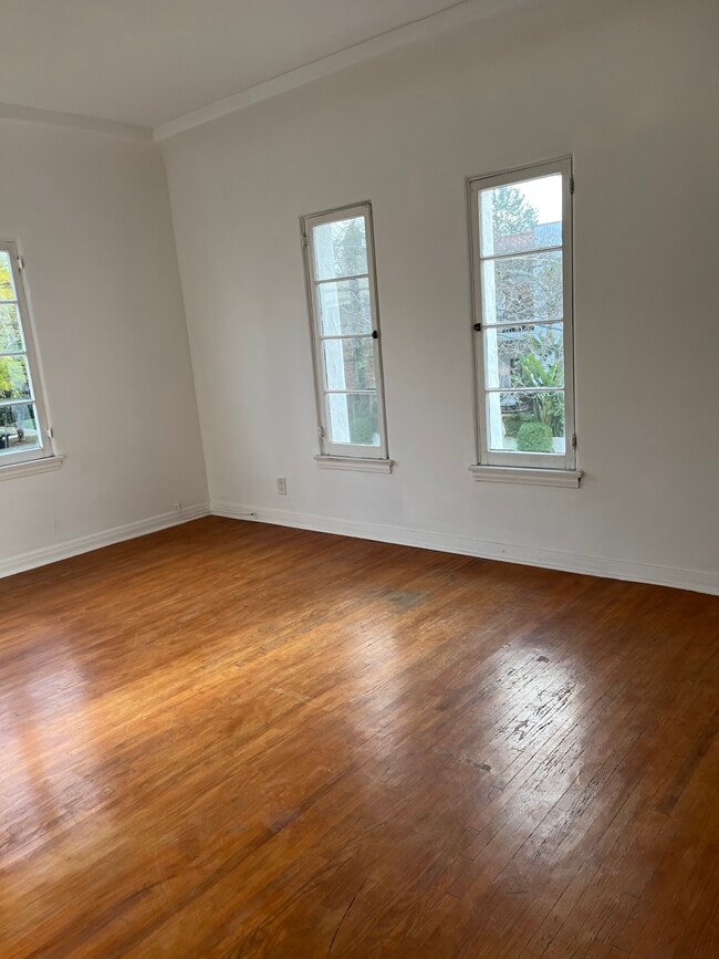 LIVING ROOM WITH VIEWS OF HOLLYWOOD HILLS - 709 N Harper Ave Unit 709 Harper