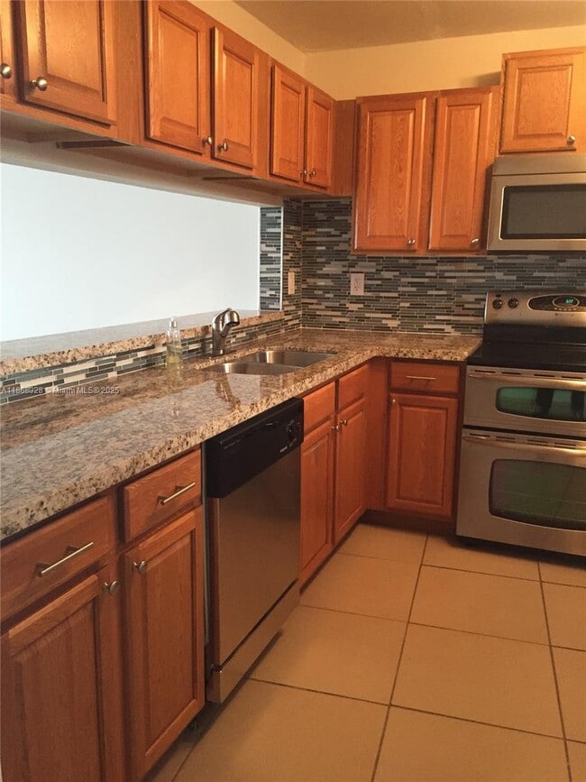 Building Photo - 10288 NW 9th St Unit 206 Rental