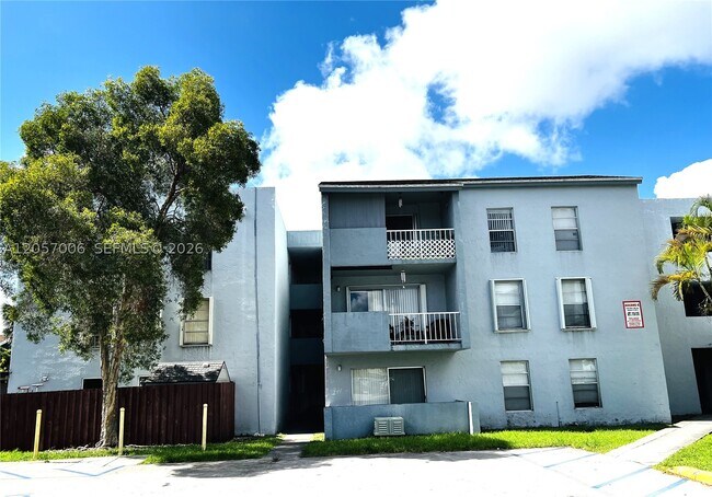 Building Photo - 6195 W 18th Ave Unit G214