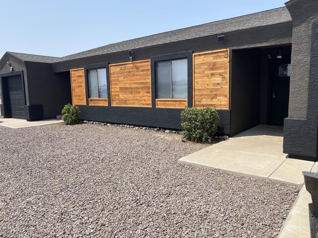 Building Photo - 8268 W Magnum Dr Unit A