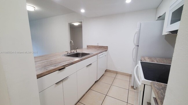 Photo - 8160 Geneva Ct Unit 104