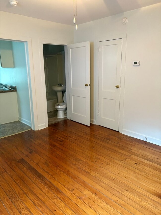 Photo - Newer windows, hardwood floors, a big pantry — and 9th Street a short walk away. Unit A