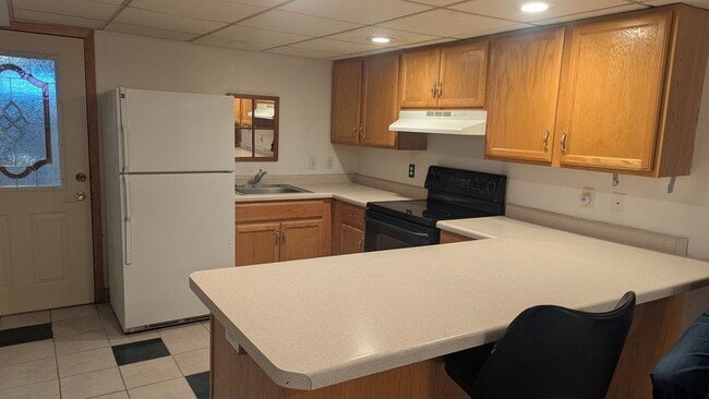 Building Photo - 1400 13th Ave NE Unit #2